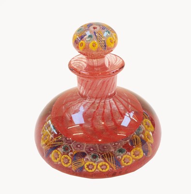 Lot 126 - A millefiori glass ink bottle and stopper, the...