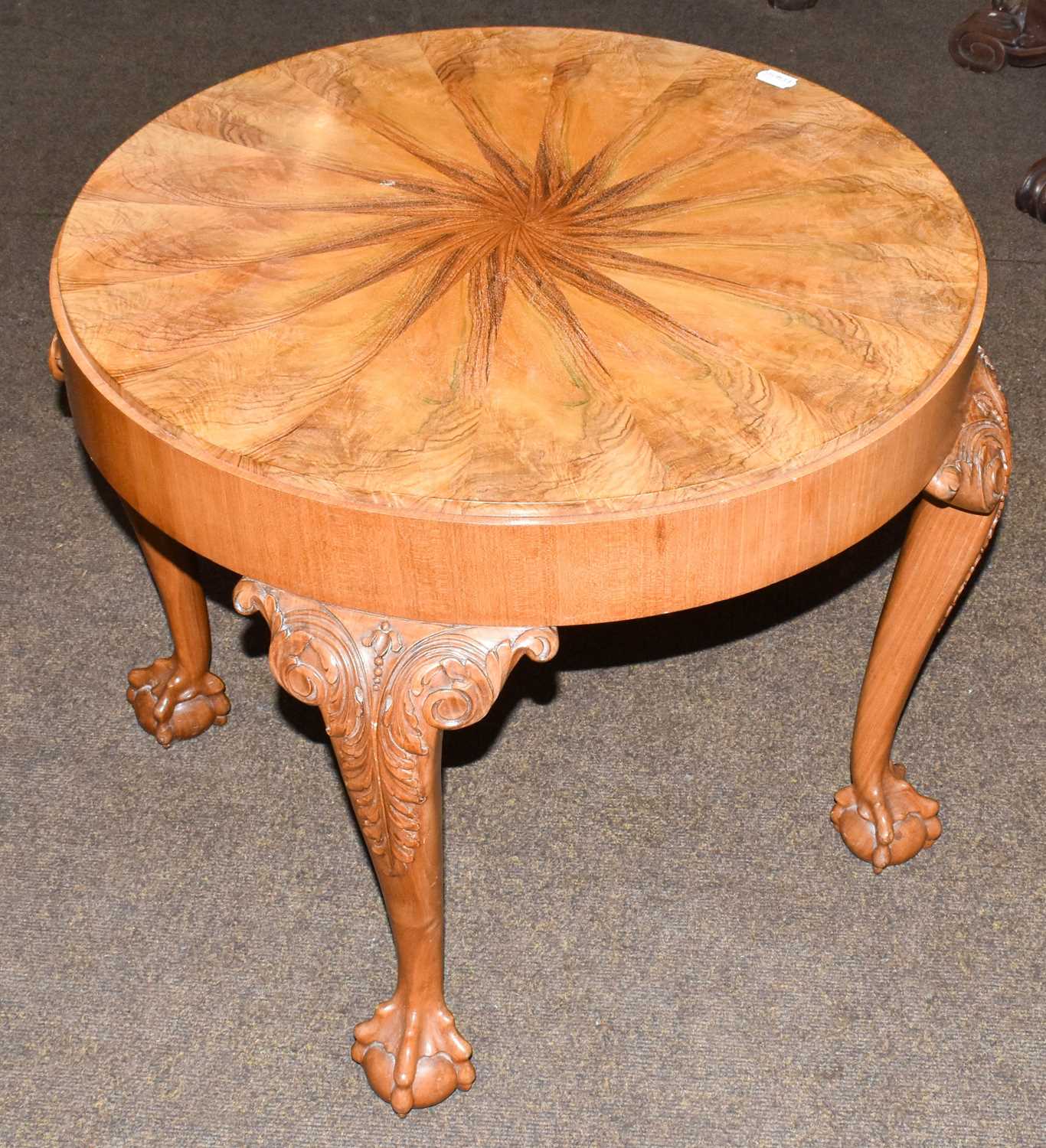 Lot 1274 - A walnut veneered circular coffee table,...