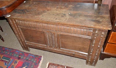 Lot 460 - An 18th century carved oak coffer