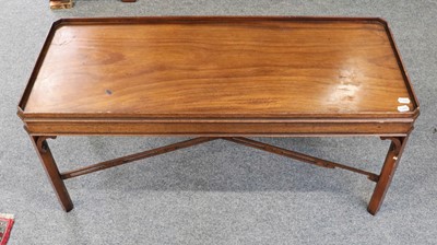 Lot 1404 - A reproduction mahogany coffee table, 107cm wide