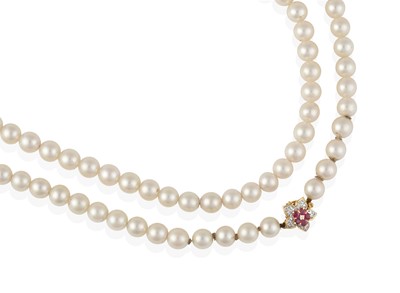 Lot 2303 - A Cultured Pearl Necklace, with a Ruby and Diamond Cluster Clasp