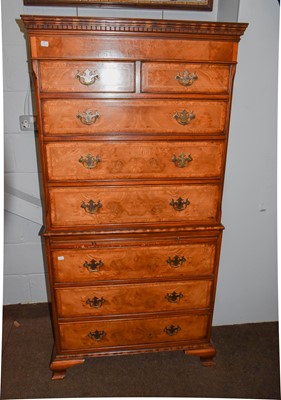 Lot 1256 - A reproduction walnut veneered chest on chest,...