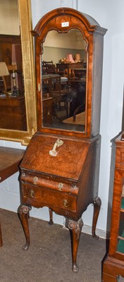 Lot 1253 - ~ A Queen Anne style small secretaire mirror...