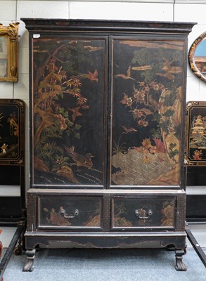 Lot 1432 - ~ A black laquered chinoiserie wardrobe, the...