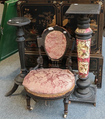 Lot 1435 - ~  Two Victorian ebonised torcheres, and a...