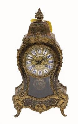 Lot 242 - A 'Boulle' striking mantle clock, retailed by...
