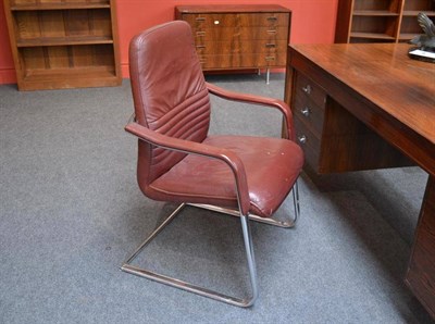 Lot 1009 - A 1970's/80's Steel Armchair, the chromed flat and tubular steel cantilevered frame upholstered...