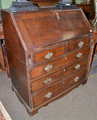 Lot 478 - An 18th century oak bureau with attractive fitted interior