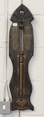 Lot 1419 - ~  A water clock, applied brass plaque,...