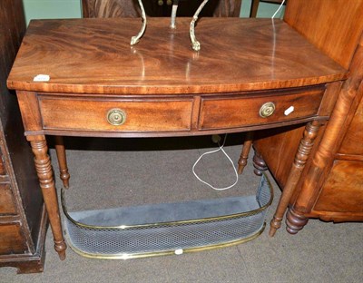 Lot 479 - George IV mahogany bow fronted writing table