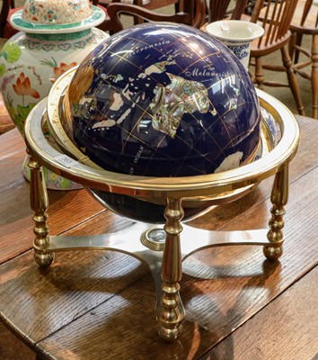 Lot 363 - A modern table globe, the countries made up...