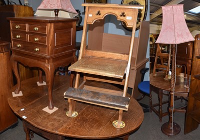 Lot 1339 - A light oak church kneeling chair, a...