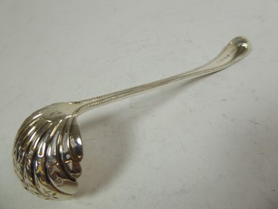 Lot 2193 - A Victorian Silver Cream-Jug, Sugar-Bowl and Ladle