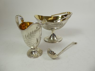 Lot 2193 - A Victorian Silver Cream-Jug, Sugar-Bowl and Ladle