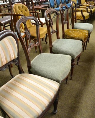 Lot 496 - A pair of Victorian rosewood dining chairs and a set of four Victorian carved walnut dining chairs