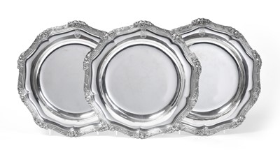 Lot 2220 - A set of Three George III Silver Dinner-Plates from the Lonsdale Service