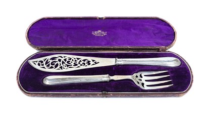 Lot 99 - A Cased Pair of Victorian Silver Fish-Servers,...