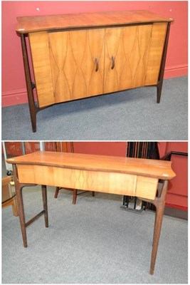 Lot 1011 - A 1950's Maple and Co. Inlaid Walnut and Teak Sideboard, the shaped rectangular top above two...