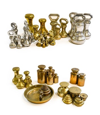 Lot 399 - A collection of brass weights, mostly WT Avery,...