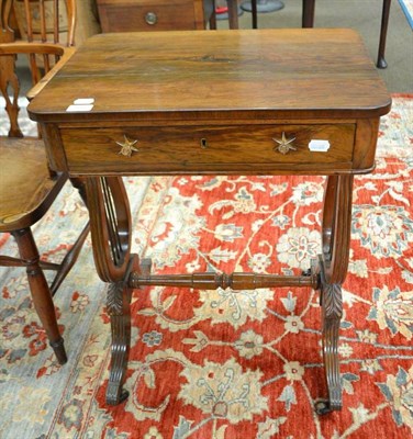 Lot 505 - Regency rosewood side table with lyre shaped supports