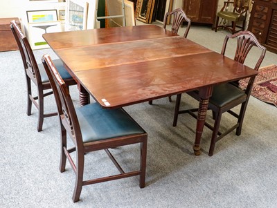 Lot 1401 - An early 19th century mahogany dining table