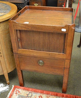 Lot 515 - George III mahogany tambour front commode