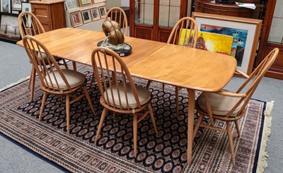 Lot 1442 - An Ercol Windsor style extending dining table,...