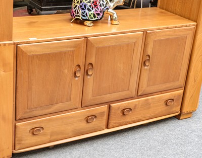 Lot 1443 - An Ercol Windsor style sideboard, with three...