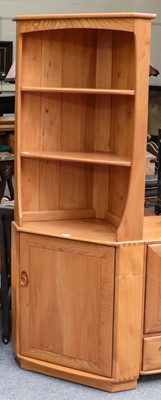 Lot 1444 - An Ercol Windsor style free standing corner...