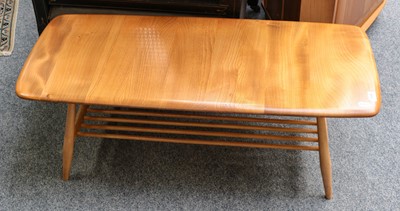 Lot 1446 - An Ercol Windsor style coffee table with...