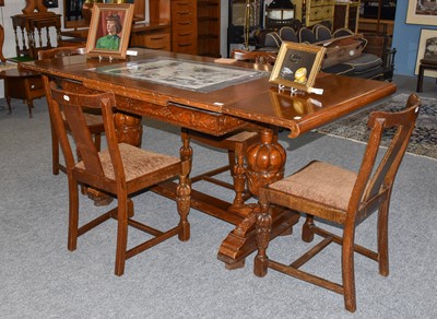 Lot 1463 - A reproduction oak dining table, the two end...