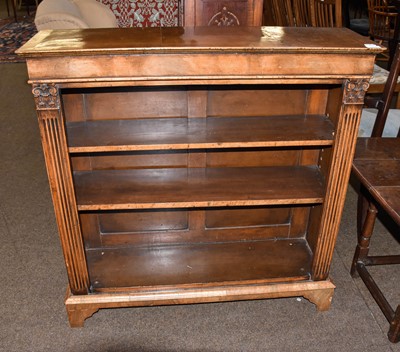 Lot 1459 - A walnut open bookcase with two adjustable...