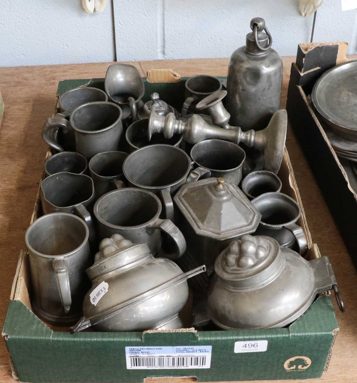 Lot 496 - A collection of pewter tankards, candle sticks...