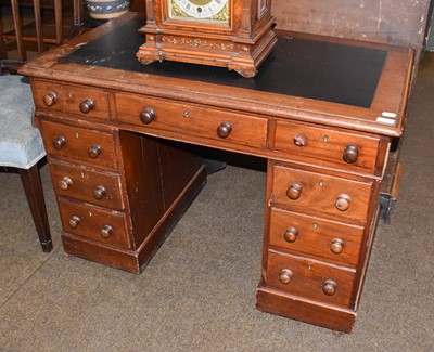 Lot 1460 - A late Victorian mahogany kneehole desk with...