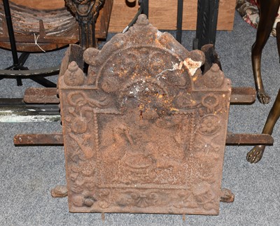 Lot 1464 - A 19th century cast iron fire back, together...