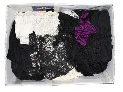 Lot 1060 - A quantity of assorted lace remnants in black...