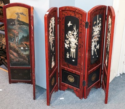 Lot 13 - A Japanese red lacquer four-fold screen, each...