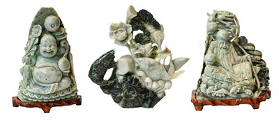 Lot A 20th century Chinese carved green hardstone...