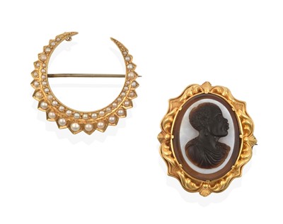 Lot 2286 - A Cameo Brooch and A Split Pearl Crescent Brooch