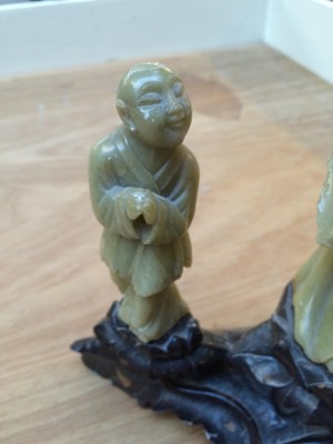 Lot 63 - A group of Oriental soapstone carvings,...