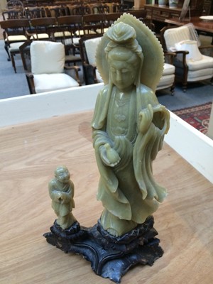 Lot 63 - A group of Oriental soapstone carvings,...