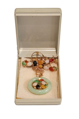 Lot 258 - A multi-gem set suite including a pendant on...