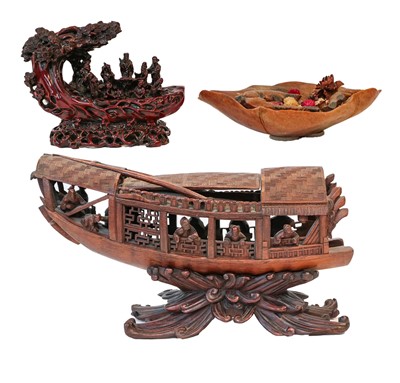 Lot 61 - A Chinese carved wooden model of a boat, 34cm,...