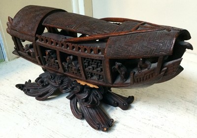 Lot 61 - A Chinese carved wooden model of a boat, 34cm,...