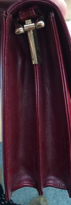 Lot 2247 - Le Must de Cartier Burgundy Leather Shoulder...