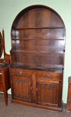 Lot 549 - Oak dresser with linen fold carved doors