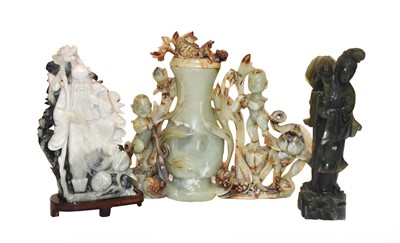 Lot 49 - 20th century Chinese green hardstone carvings,...