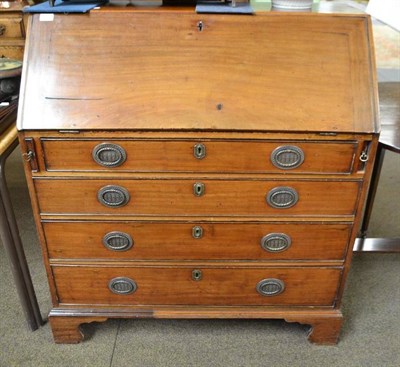 Lot 555 - George III mahogany bureau with fitted interior