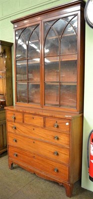 Lot 556 - Regency mahogany six drawer chest and associated bookcase top (a marriage)