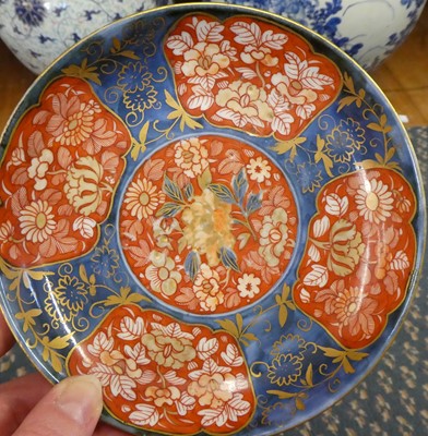 Lot 102 - ^ An Imari Porcelain Tea Bowl and Saucer, Edo...